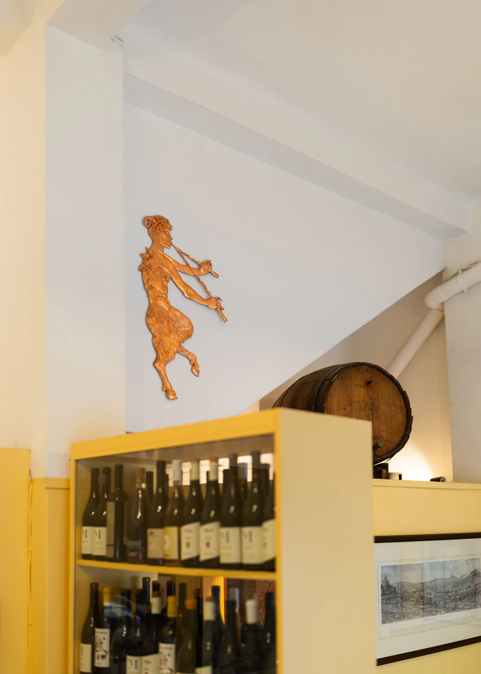 Karagiozis above the wine cabinet